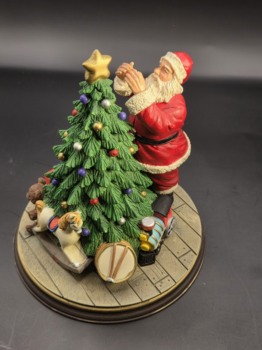 Festive Santa Decorating Green Christmas Tree Figurine
